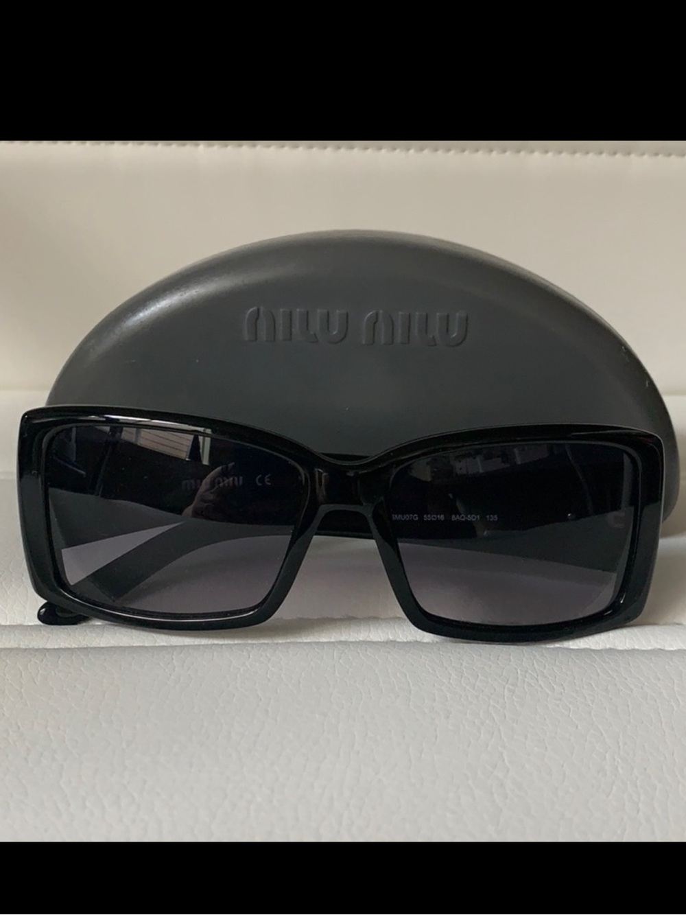 Miu Miu Glossy Black Oversized Rectangular Sunglasses